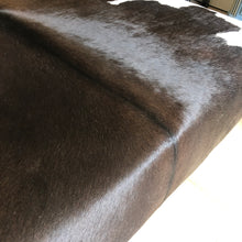 Load image into Gallery viewer, Bespoke Large Black/Brown &#39;Dairy&#39; Cowhide Ottoman / Footstool
